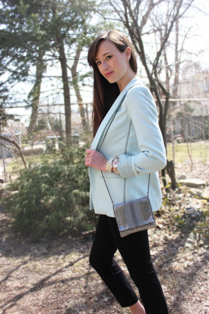 Style Bee in a blue blazer, black pants and silver purse