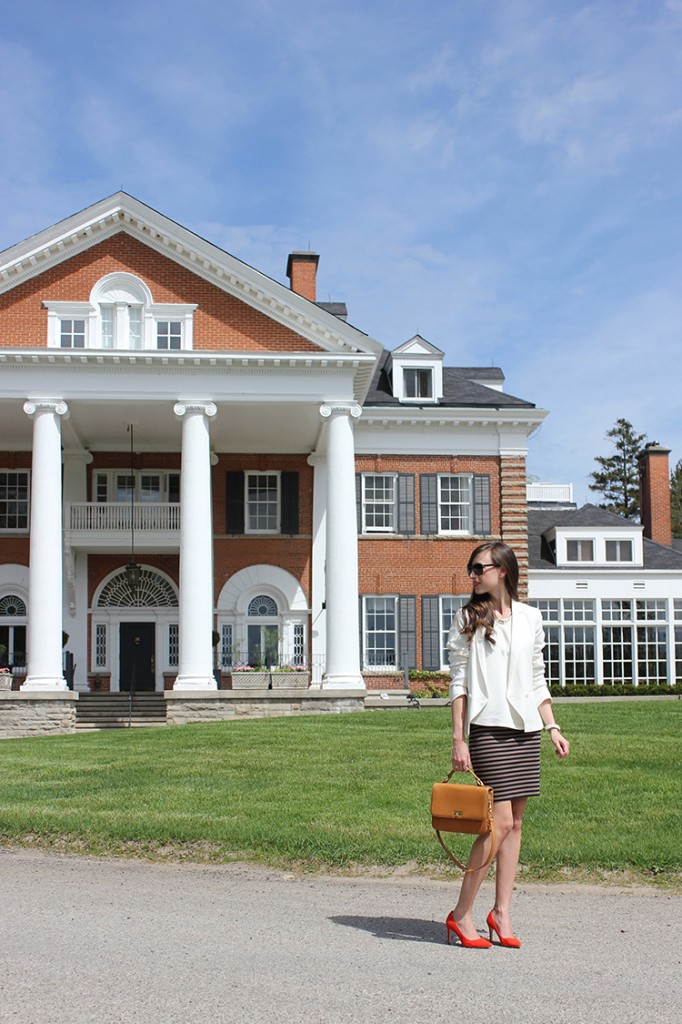 Style Bee in White top, striped skirt, red heels at Langdon Hall