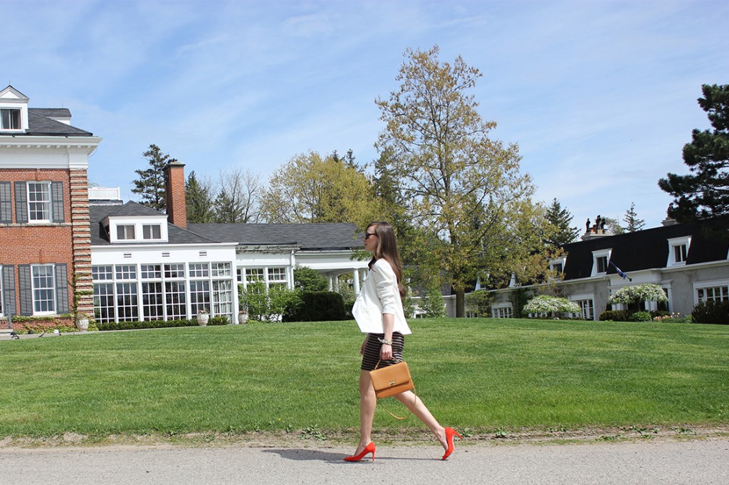 Style Bee in White top, striped skirt, red heels at Langdon Hall