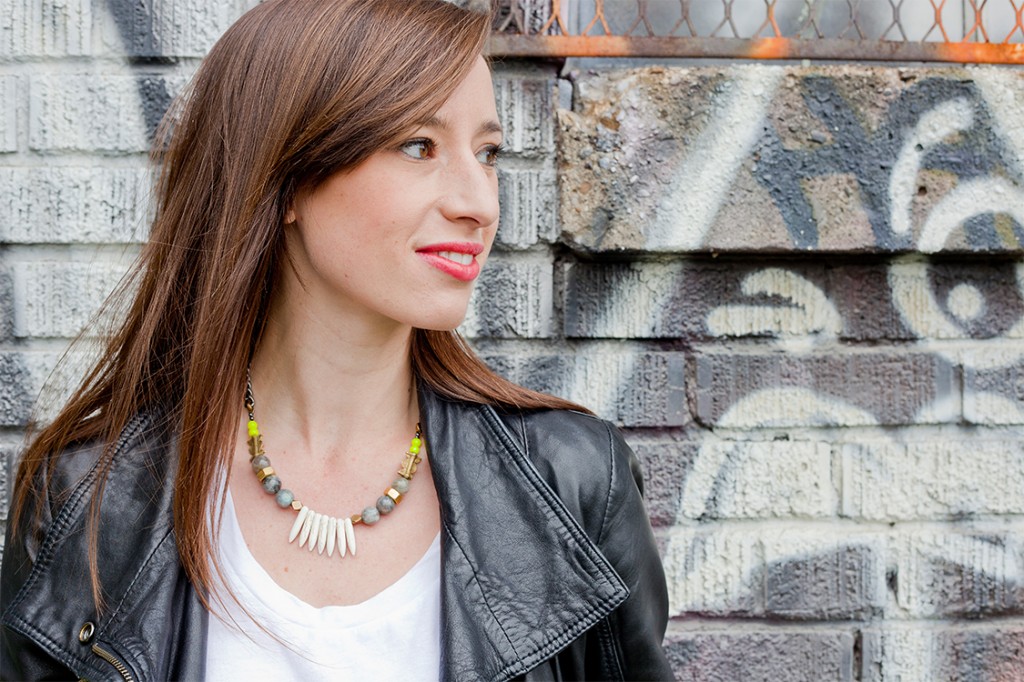 Style Bee in Biko necklace, leather jacket and white tee.