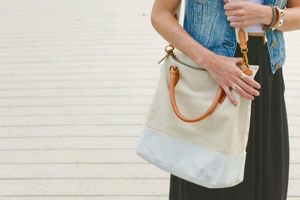 Style Bee in black maxi skirt, White crop tee, denim vest, with canvas tote