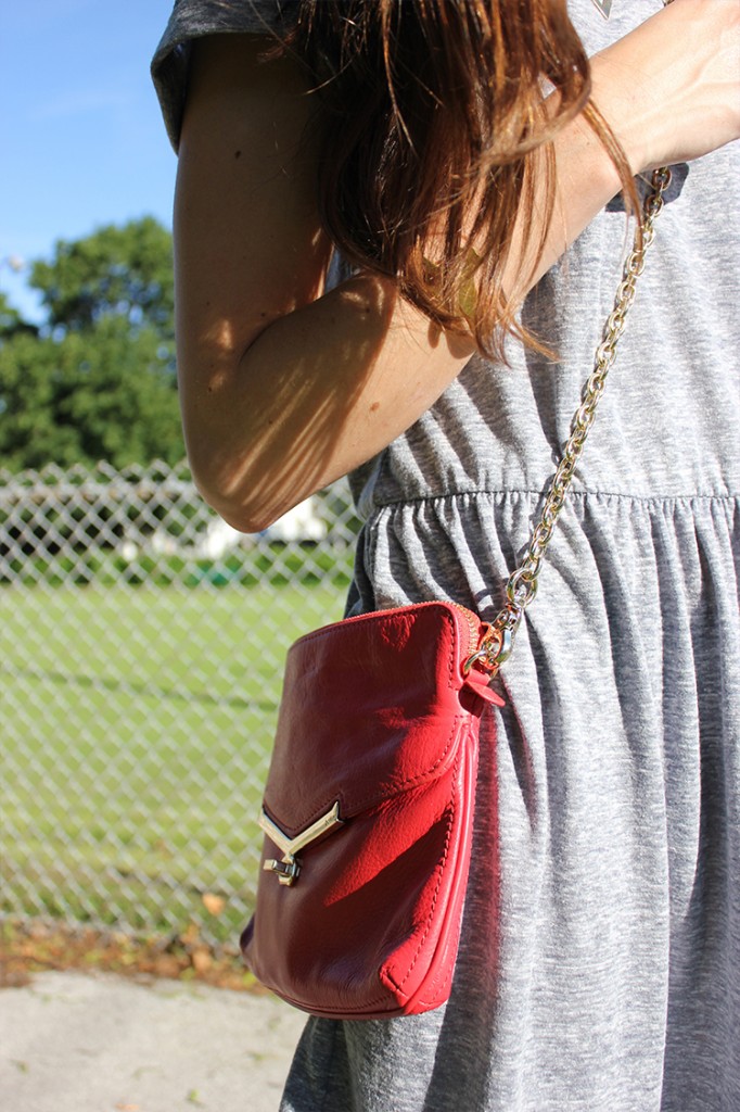 Style Bee in a grey dress, botkier bag.