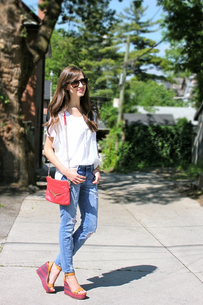 Style Bee in a white top, ripped jeans and Botkier bag and Coach platforms.
