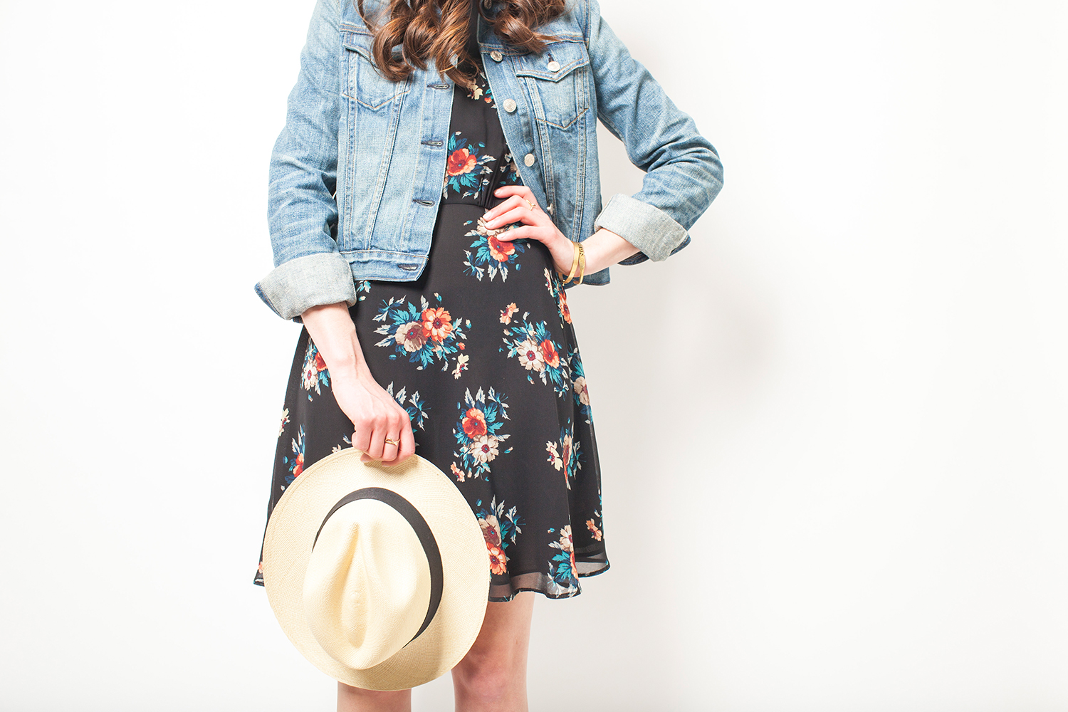 Style Bee in a floral dress and denim jacket.