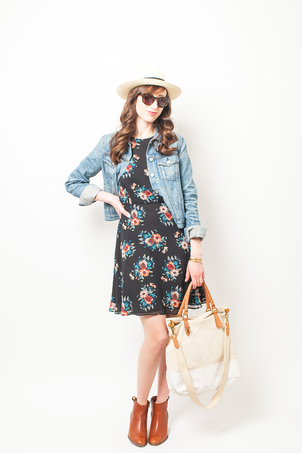 Style Bee in a floral dress and denim jacket.