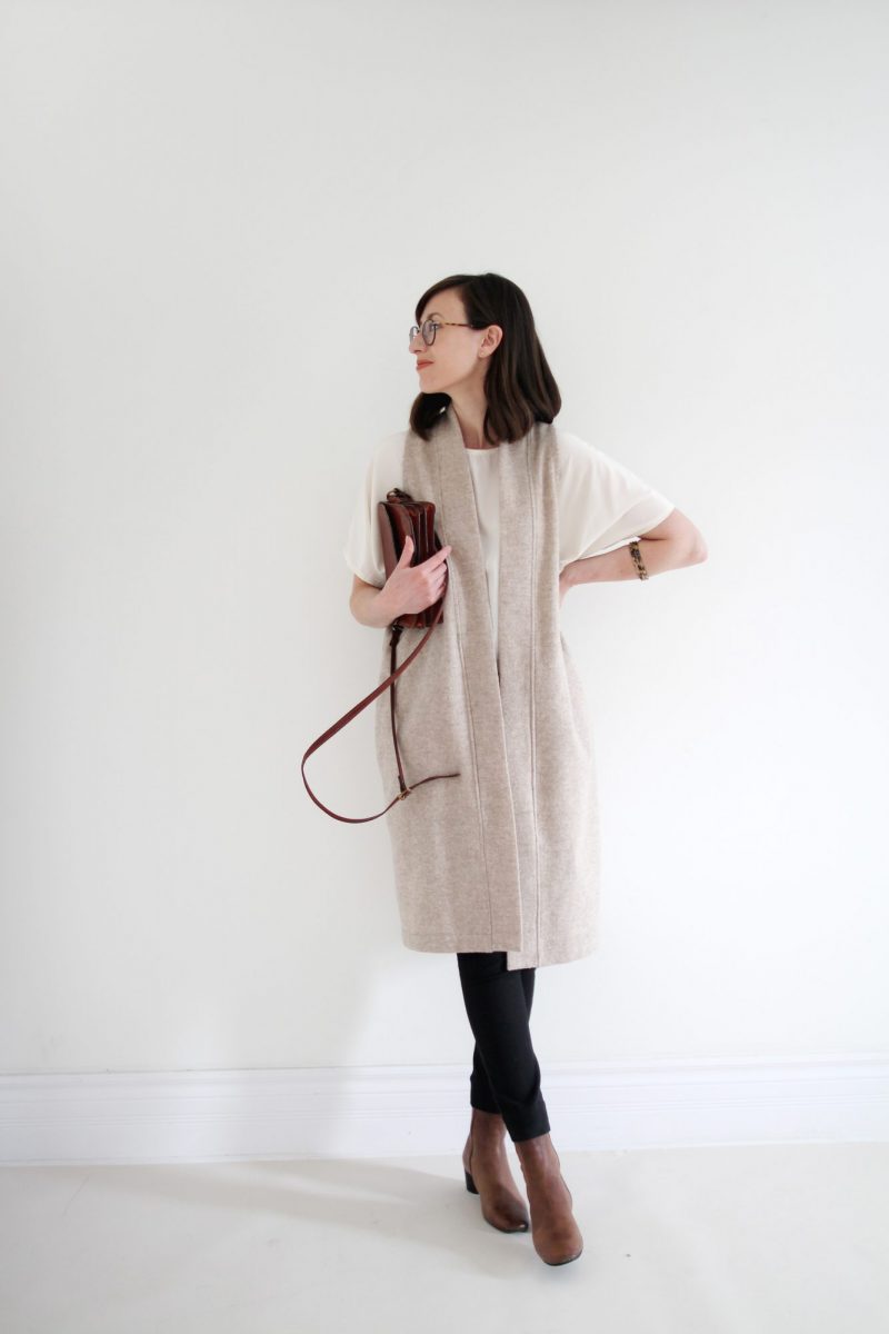 Style Bee - Winter Palette - Black Slim Pant + Loose White Top + Wool Vest + Taupe Boots + Tortoise Bangles