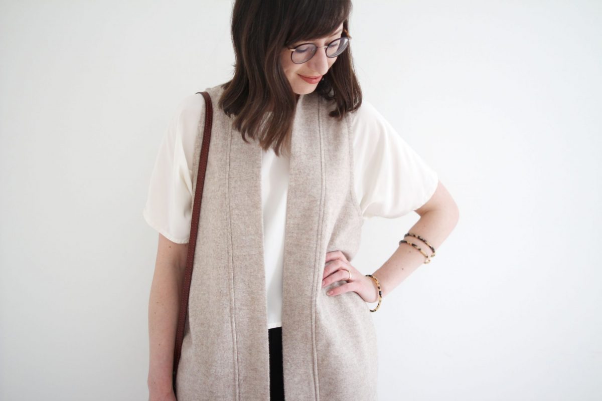 Style Bee - Winter Palette - Black Slim Pant + Loose White Top + Wool Vest + Taupe Boots + Tortoise Bangles