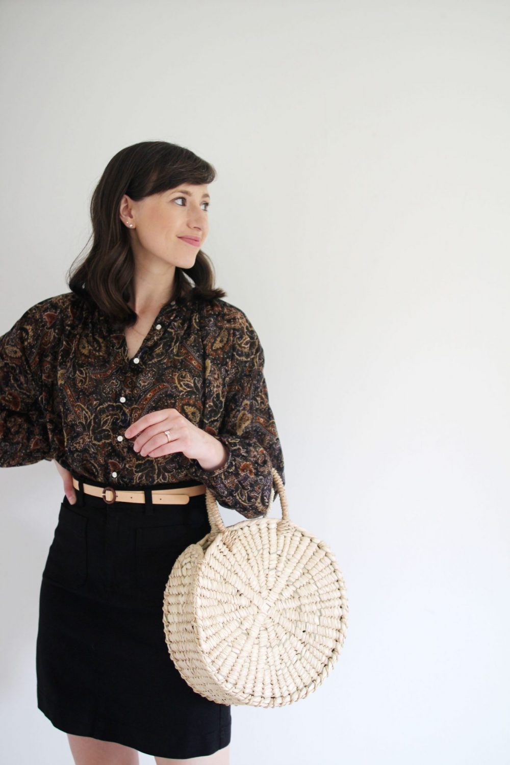 August Outfits - Look 2 - Paisley Blouse + Black Mini Skirt + Nude Belt + Clogs + Woven Circle Tote 