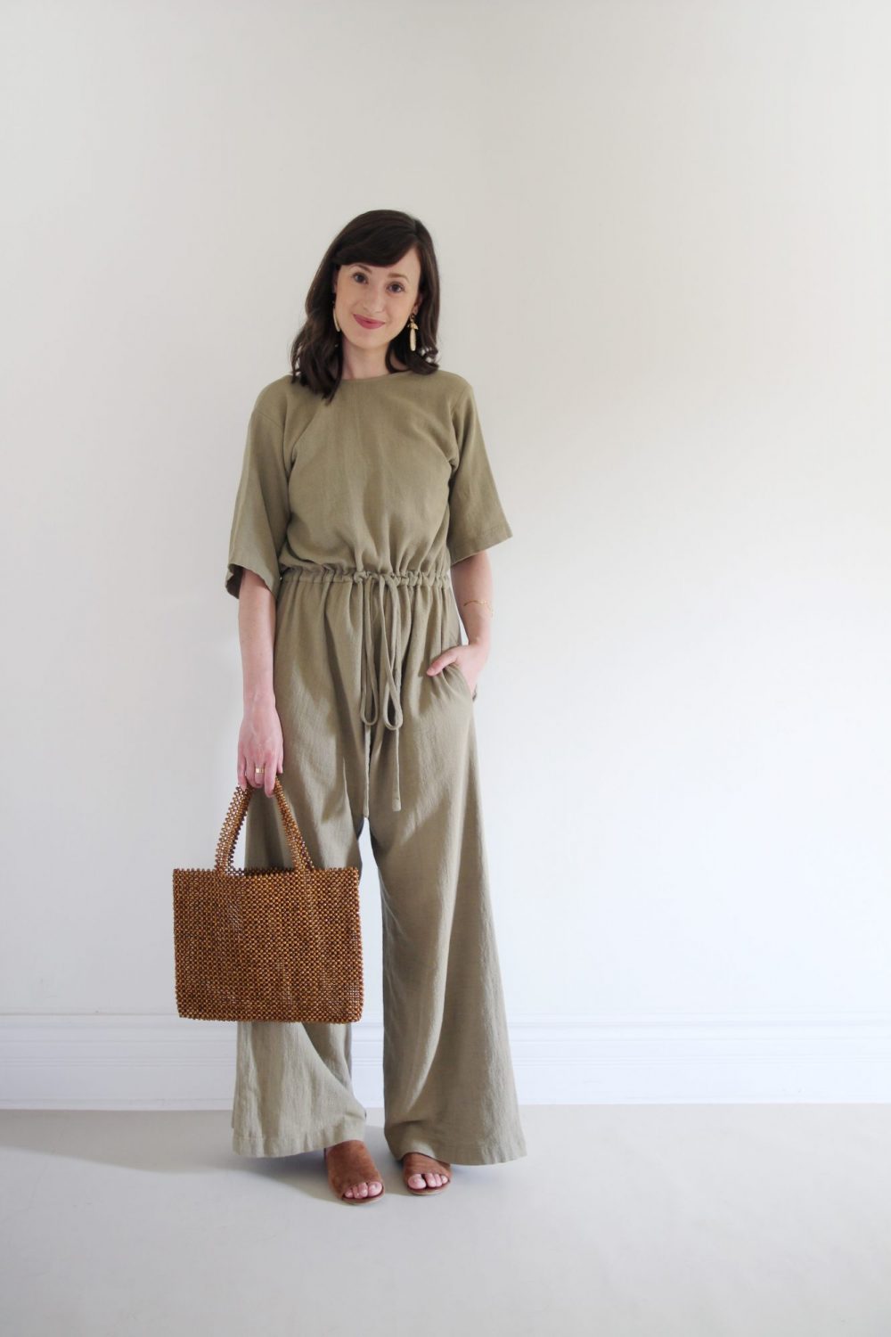 Style Bee - August Outfits - Look 3 - Duffy Jumpsuit + Suede Slides + Beaded Bag + Woven Earrings