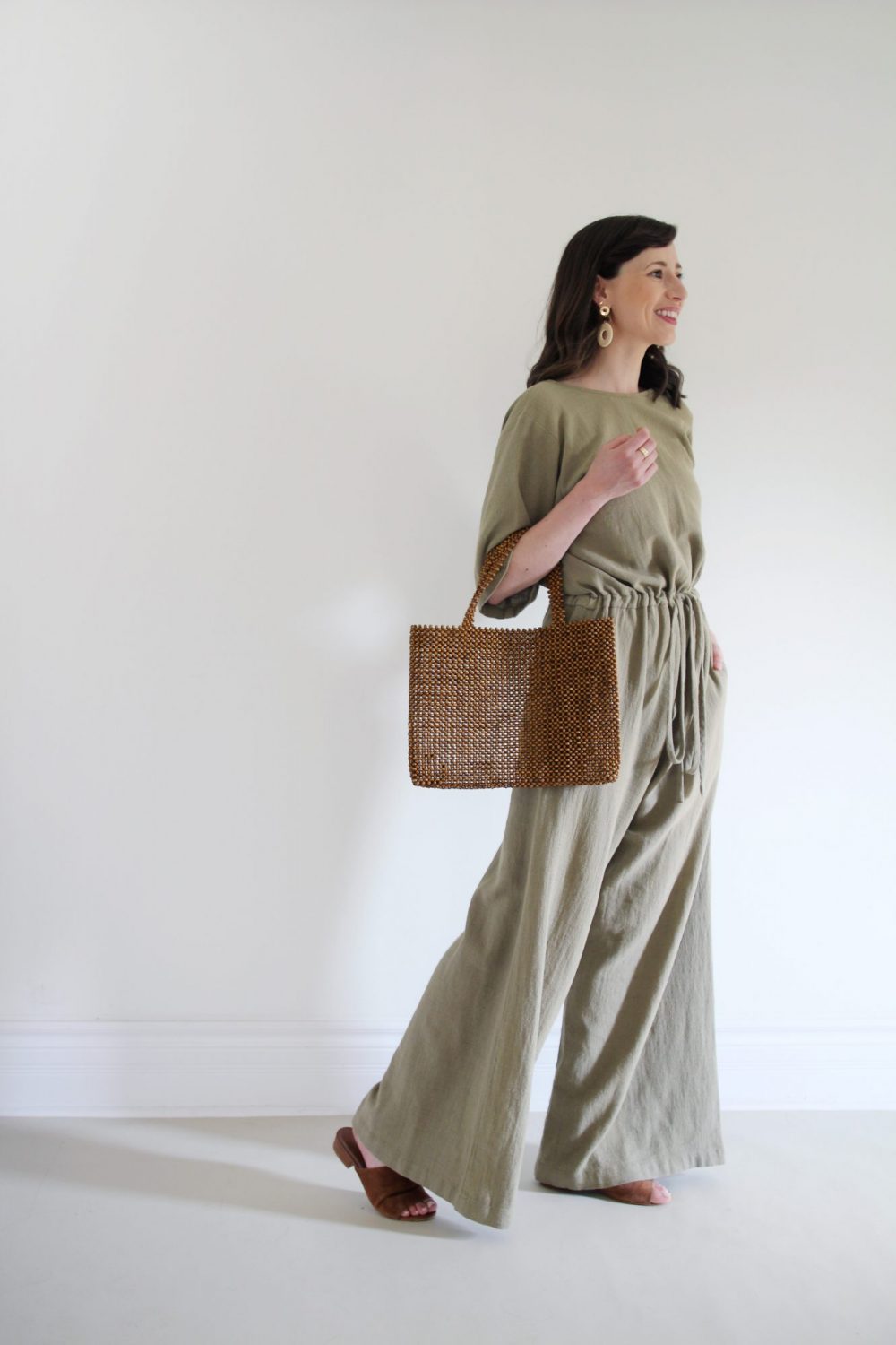 Style Bee - August Outfits - Look 3 - Duffy Jumpsuit + Suede Slides + Beaded Bag + Woven Earrings