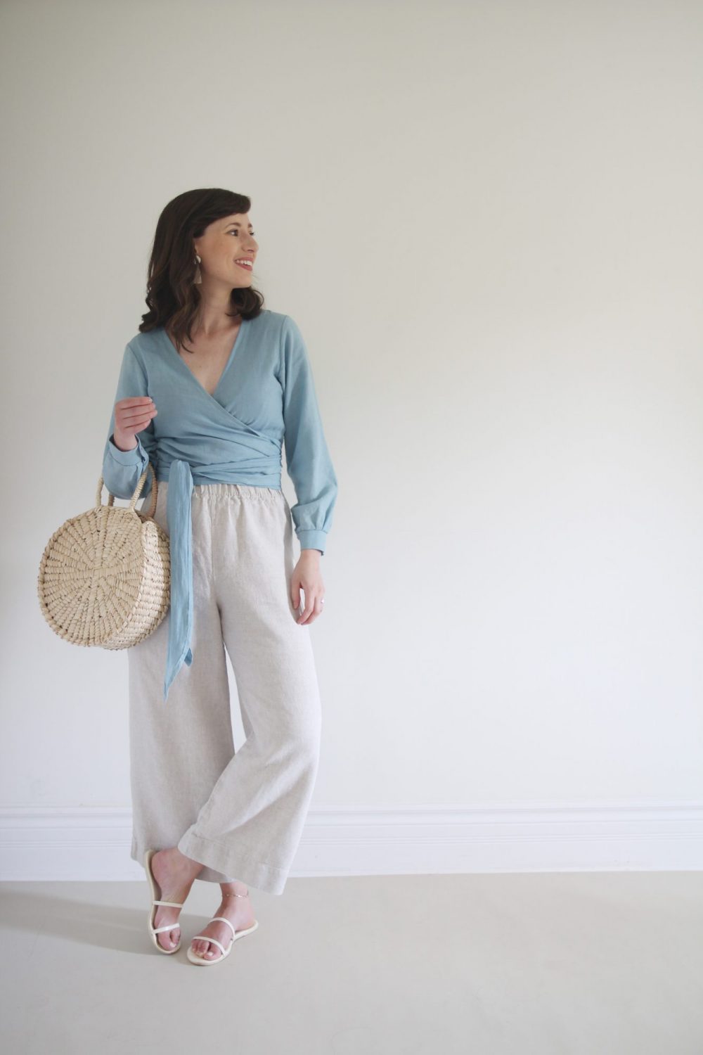 Style Bee - August Outfits #3 - Blue Wrap Top + Flax Florence Pant + Gemma Flat Sandal + Circulo Tote + Tassel Earrings