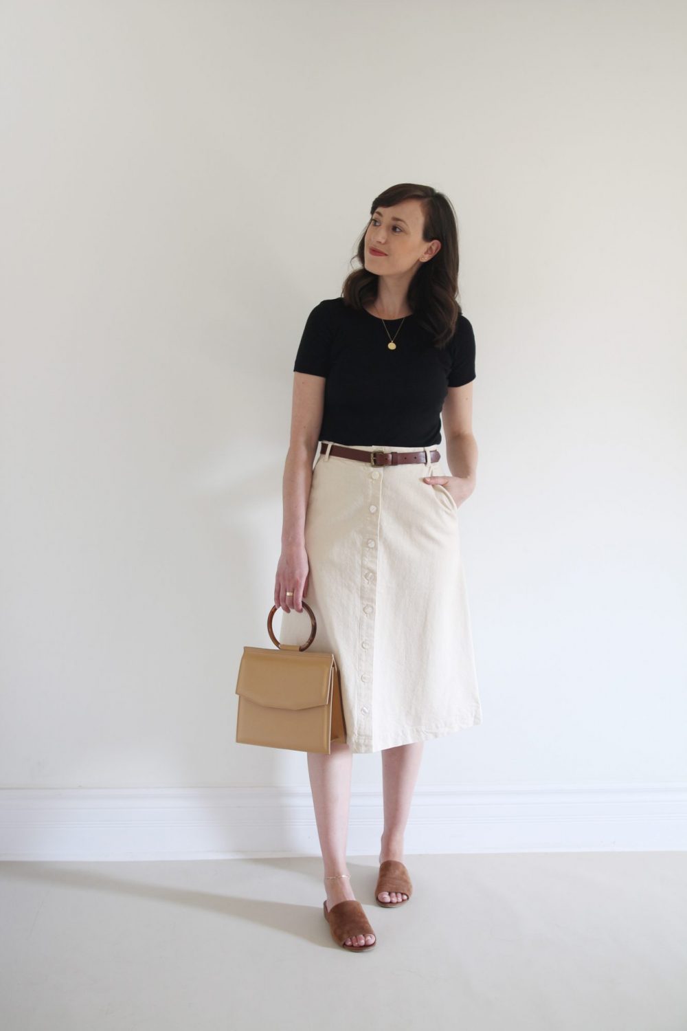 Style Bee - August Outfits - Look 6 - Black Tee + Cream Skirt + Brown Belt _Suede Slides + Structured Bag