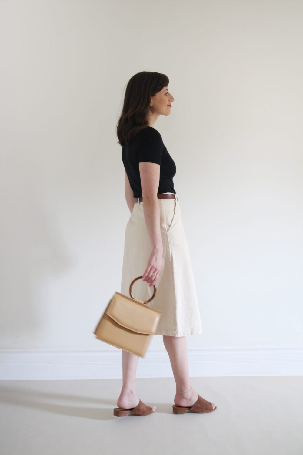 Style Bee - August Outfits - Look 6 - Black Tee + Cream Skirt + Brown Belt _Suede Slides + Structured Bag