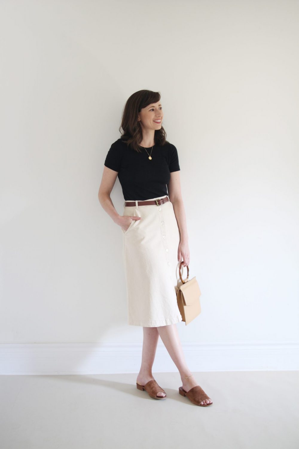 Style Bee - August Outfits - Look 6 - Black Tee + Cream Skirt + Brown Belt _Suede Slides + Structured Bag